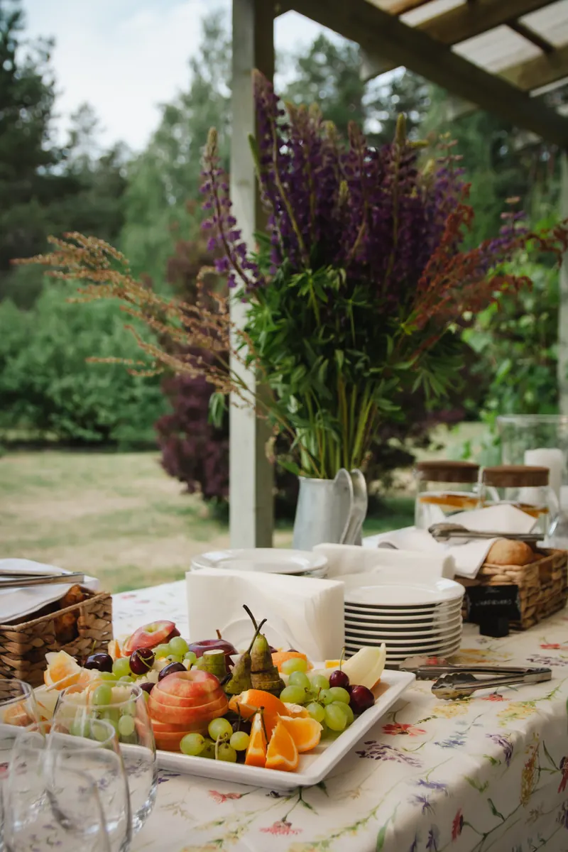 Flowers and fruit on a festive table