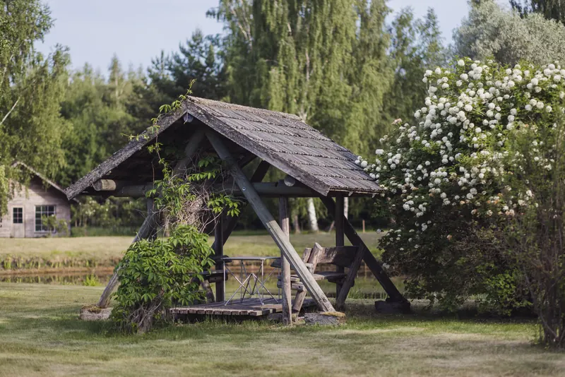 Wooden gazebo in the Susimetsa garden